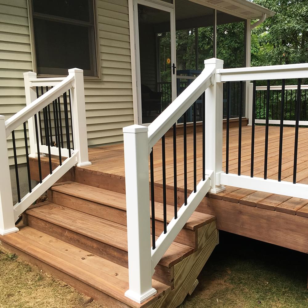 Photo of a vinyl railing style linking to the railing accessories page