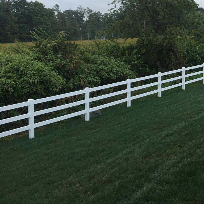 3 Rail Ranch Rail across green grass