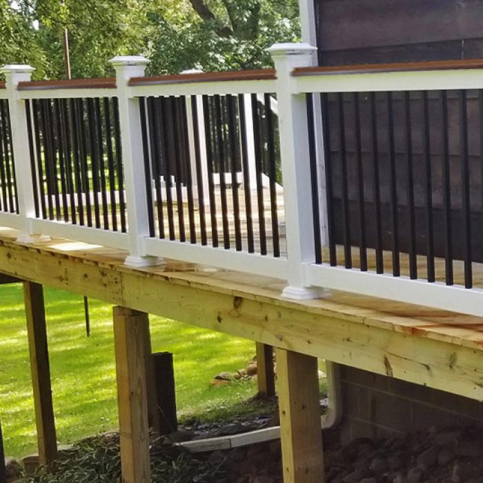 Brown Lancaster Railing on Shiny Deck