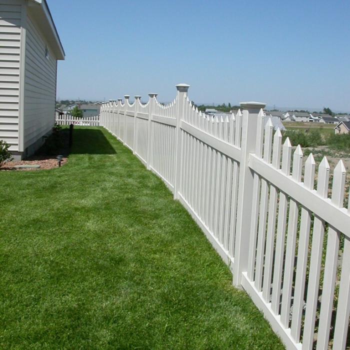 Tan Ellington installed vinyl picket fence