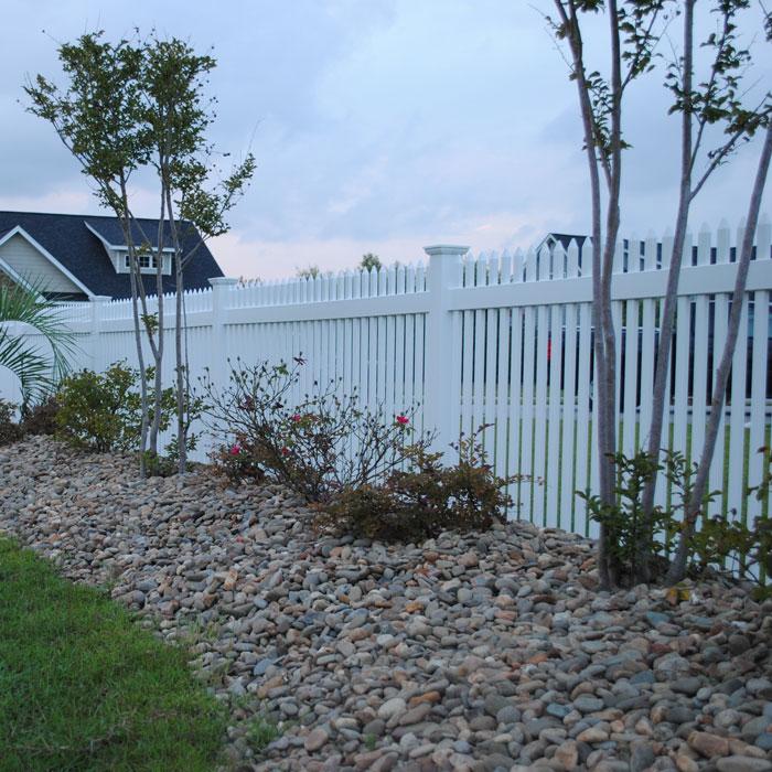 Hartford picket fence with stone landscaping