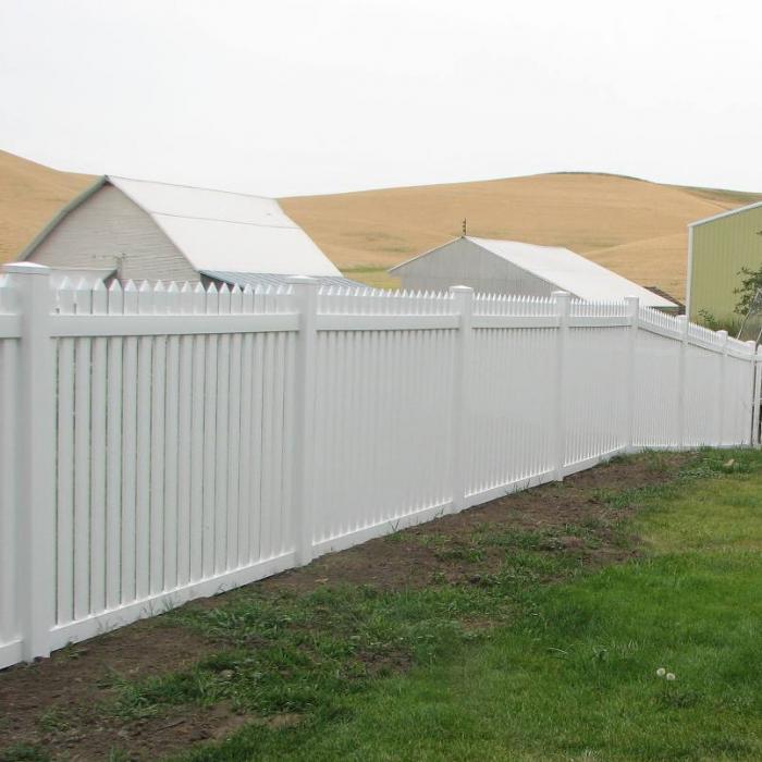 provincetown white picket fencing around a farm with barns